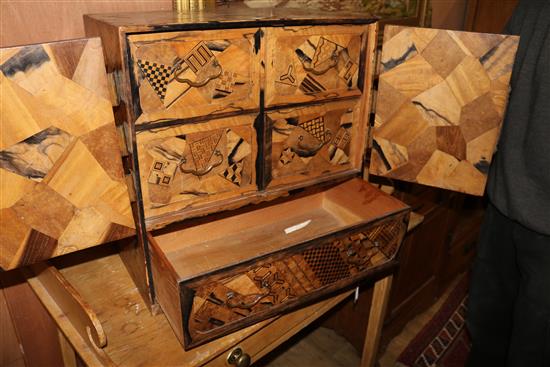 A Japanese parquetry chest/cabinet W.54cm